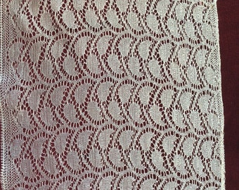 Very fine antique lace in silk or very light rayon of white color measuring 17cm wide and sold by the meter