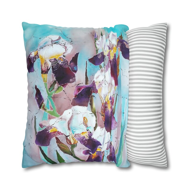 Introduce a touch of nature-inspired elegance to your living space with our Purple Irises Batik Art Pillow Cover. This exquisite piece seamlessly combines the beauty of batik artistry with the vibrant hues of purple irises.