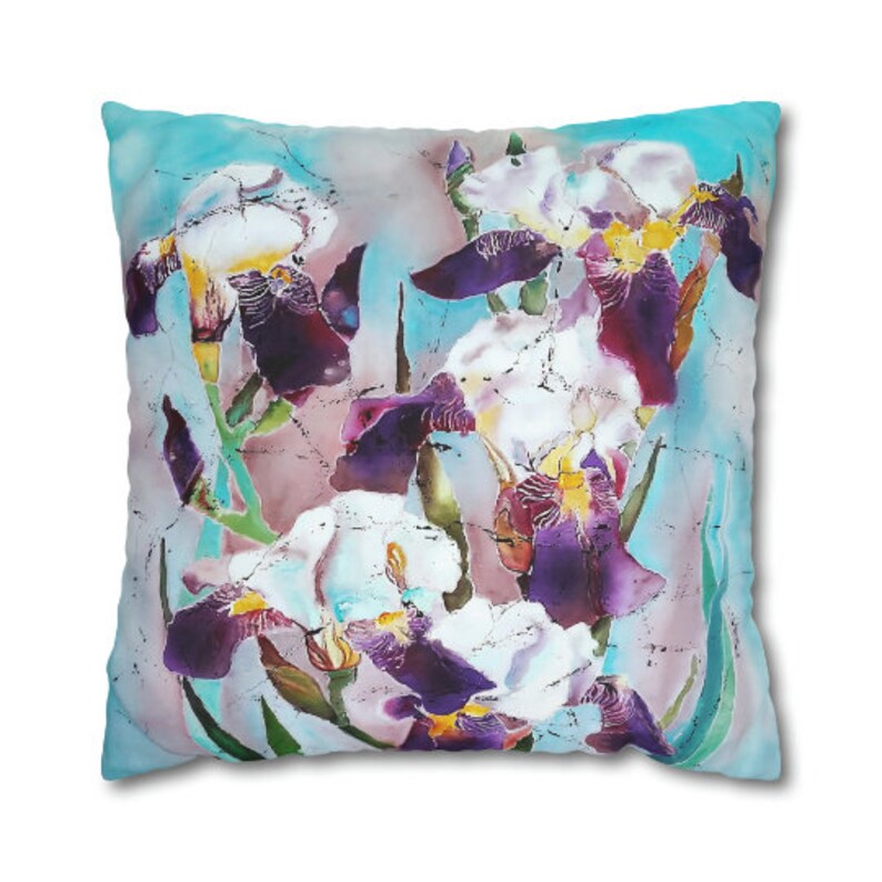 Introduce a touch of nature-inspired elegance to your living space with our Purple Irises Batik Art Pillow Cover. This exquisite piece seamlessly combines the beauty of batik artistry with the vibrant hues of purple irises.