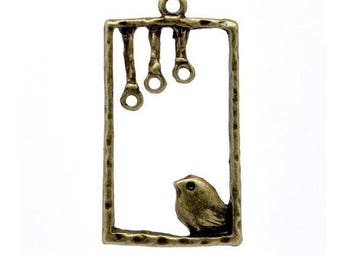 Pendentif Charm Oiseau sur perchoir Couleur bronze 35x19mm