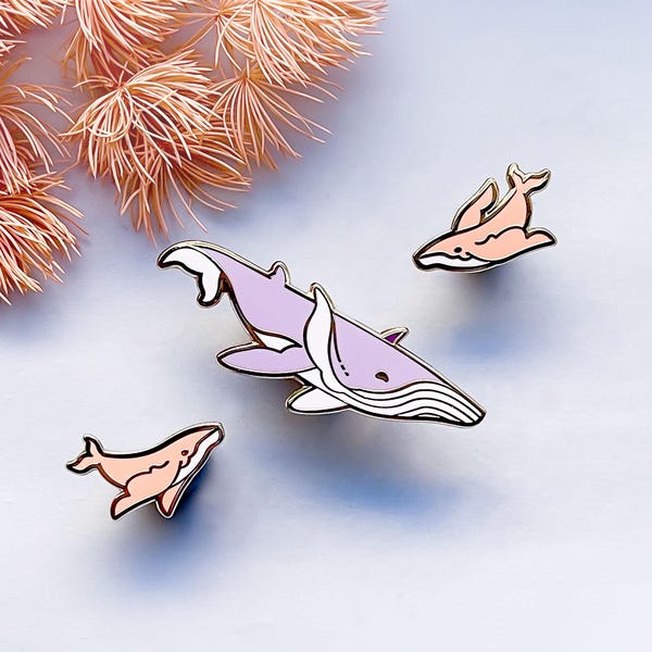Juego de pines esmaltados caprichosos de ballenas aladas de fantasía