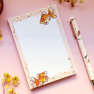 Starry Goldfish Dotted Grid Notepad