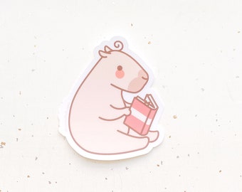 Curly the Capybara Reading  Clear Vinyl Sticker