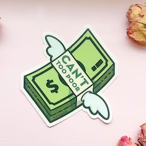 May include: A green and white sticker with a cartoon image of a dollar bill with wings. The dollar bill has the text "CAN'T TOO POOR" on it.