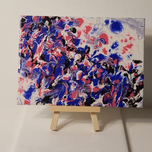 Fluid Art Painting Crowded Venue image 1
