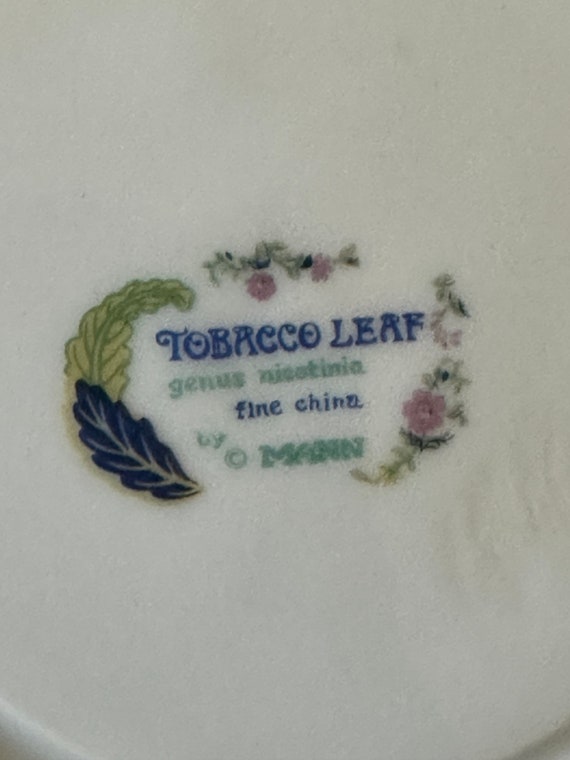 tobacco leaf fine china by mann 70s Porcelain 9 Bowl Genus Nocotinia Floral VTG A small phoenix bird perches on the leaves of the flowering Nicotiana (Tobacco) plant Tobacco Leaf Dinner Plate by