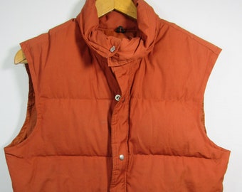 orange puffy vest