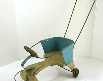 antique metal stroller
