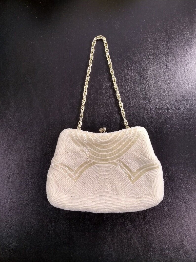 white beaded clutch bag