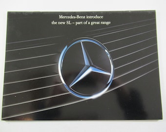 May include: A black and white brochure with the Mercedes-Benz logo and the text "Mercedes-Benz introduce the new SL - part of a great range".