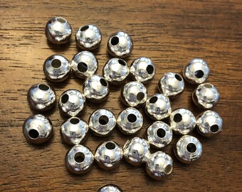 100 7mm Bead Spacers  100 pieces.