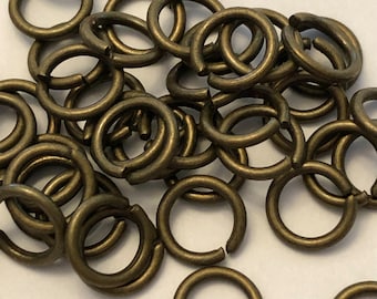 100 8mm Antique Bronze 25 gauge.