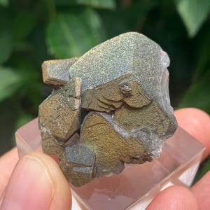 Iridescent Chalcopyrite on Calcite | China