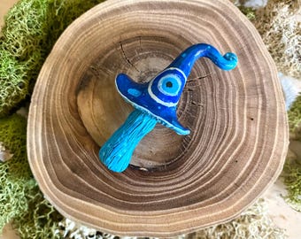 Seta de arcilla con ojo maligno, pieza única.