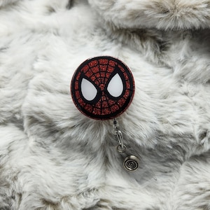Spider inspired badge reel