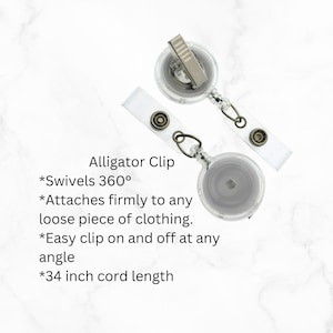 May include: A clear retractable badge holder with a silver alligator clip. The holder has a 34 inch cord and swivels 360 degrees.