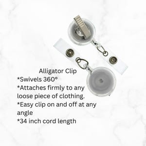 May include: A clear retractable badge holder with a silver alligator clip. The holder has a 34 inch cord and swivels 360 degrees.