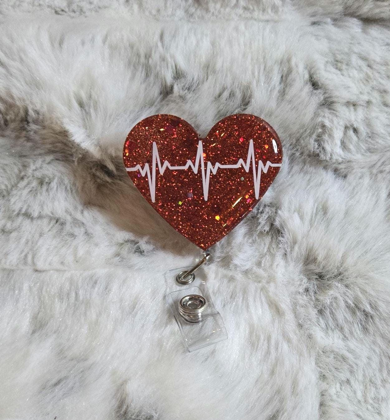 Ekg heart badge reel
