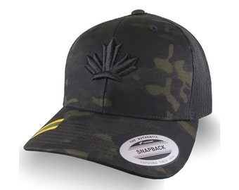 3D Puff Black Maple Leaf Raised Embroidery on an Adjustable Black Multicam Structured Premium Mid-Profile Yupoong Trucker Mesh Cap