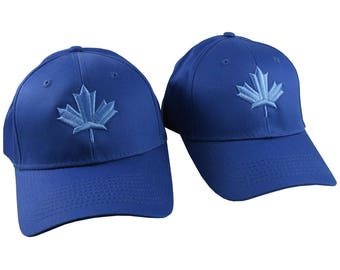 Pair of Canadian Blue Maple Leaf 3D Puff Style Embroidery Designs on 2 Royal Blue Adjustable Structured Baseball Caps Adult + Child Age 6-12