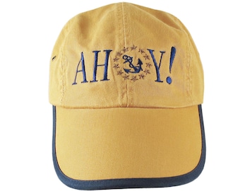 Ahoy! American Yacht Anchor Greeting Embroidery on Polo Style 5 Panel Adjustable Mango and Navy Unstructured Cap for the Boating Enthusiast