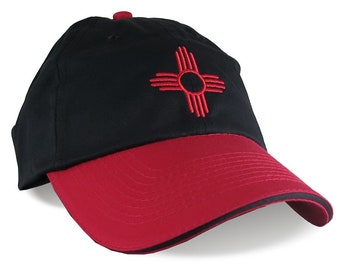 New Mexico Zia Symbol Red Embroidery on an Adjustable Red and Black Unstructured Dad Hat Style Baseball Cap with Personalization Options