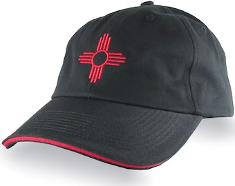 New Mexico Zia Symbol Red Embroidery on an Adjustable Black Unstructured Dad Hat Style Baseball Cap with Personalization Options