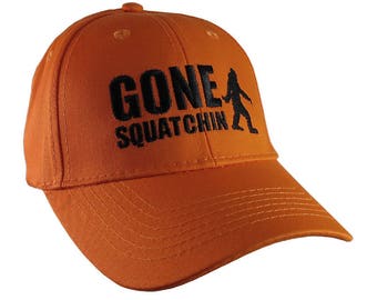 Gone Squatchin Black Sasquatch Bigfoot Humorous Embroidery Design on an Orange Adjustable Structured Baseball Cap for Kids Age 6 to 12