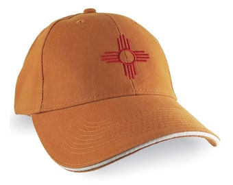 New Mexico Zia Symbol Embroidery on an Adjustable Burnt Orange Soft Structured Classic Baseball Cap with Personalization Options