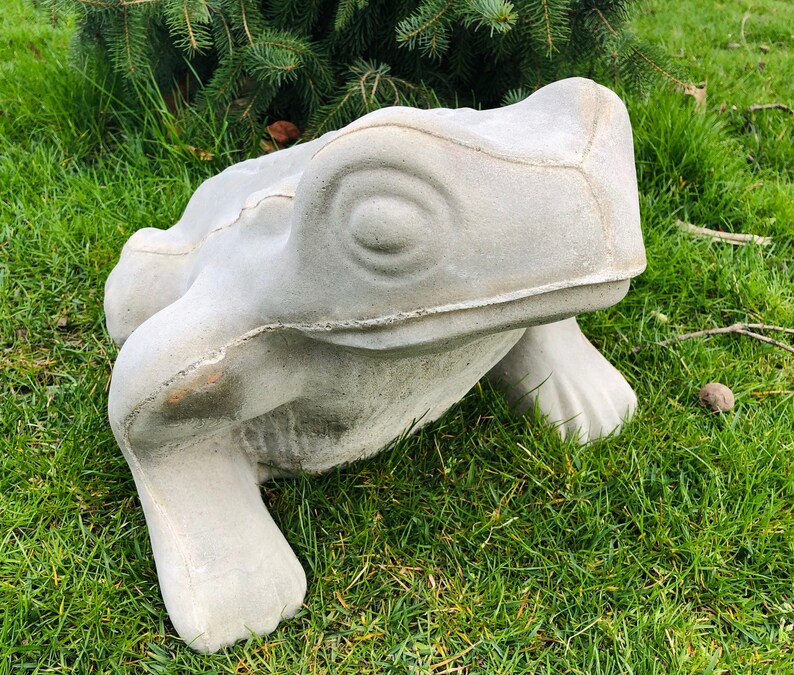 concrete frog statue