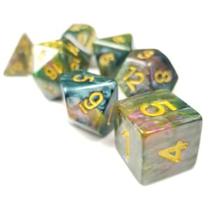 May include: A set of eight green, blue, and purple dice with gold numbers. The dice are scattered on a white surface.