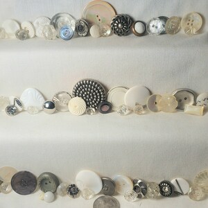 Collection of 57 unique vintage buttons