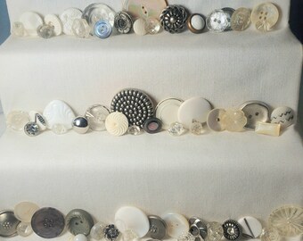 Collection of 57 unique vintage buttons
