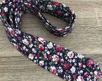Floral navy with pink tie