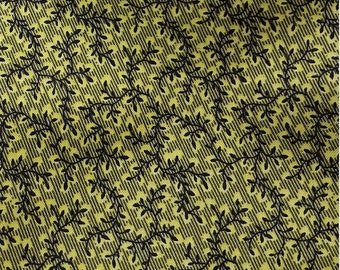 pretty patchwork fabric 100% cotton black and yellow foliage on green background