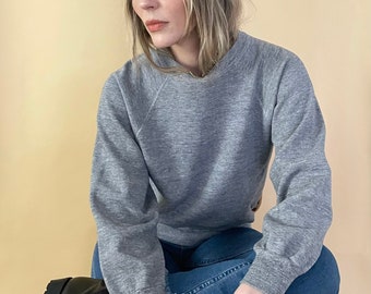 light grey sweaters