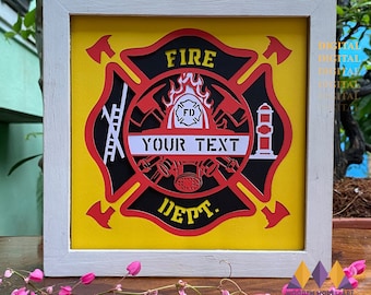 May include: A white frame with a yellow background and a red, black, and white fire department logo. The logo has a fire helmet, an axe, a ladder, and a fire hydrant. The text "FIRE DEPT." is in the center of the logo. The text "YOUR TEXT" is in a white banner below the logo.