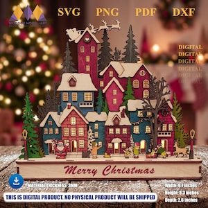 Puede incluir: Un pueblo navideño de madera de varias capas con casas rojas y azules, abetos, Santa Claus y renos. La base dice Merry Christmas. El texto incluye SVG, PNG, PDF, DXF, DIGITAL y unas dimensiones de 24,6 por 21,1 por 6,6 cm.