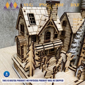 May include: A laser-cut wooden Christmas village scene featuring a two-story house with a chimney, windows, and a porch. The scene includes Santa Claus and other festive figures. The text "SVG PNG PDF DXF" is visible. The text "THIS IS DIGITAL PRODUCT. NO PHYSICAL PRODUCT WILL BE SHIPPED" is also visible.