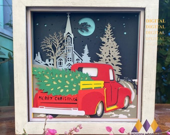May include: A red pickup truck with a Christmas tree in the back, driving past a church at night. The truck has the words "Merry Christmas" on the back. The scene is depicted in a paper cut-out style.