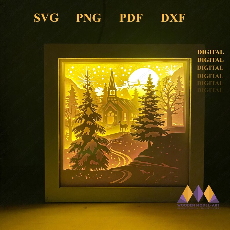 May include: A digital download of a 3D layered papercraft design for a lighted Christmas scene. The design features a church, trees, a path, and a deer in a snowy forest setting. The design is illuminated by a warm yellow light.