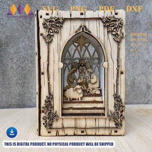 May include: A wooden laser-cut nativity scene. The layered design depicts the holy family, a star, and sheep within an arched frame. The frame is decorated with leaf and vine accents. The text "THIS IS DIGITAL PRODUCT. NO PHYSICAL PRODUCT WILL BE SHIPPED" is at the bottom.
