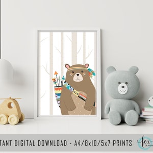 May include: A digital printable featuring a brown bear wearing a colorful headdress and holding arrows in a forest setting. The bear is wearing a colorful sash with geometric patterns. The background is a white birch forest.