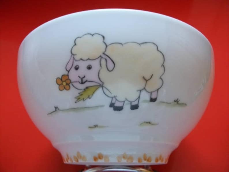 Limoges porcelain children/'s plate decorated with a Mouton carrying a flower round hollow plate painted by hand.