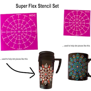 May include: Two pink stencils with a circular pattern of dots and the text "HDC" in the top right corner. The stencils are used to help dot pieces like the black mug with a colorful dot mandala design.