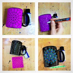May include: A step-by-step guide to painting a mandala design on a black ceramic mug. The first image shows a pink stencil on a black mug. The second image shows a hand using a white chalk marker to trace the stencil. The third image shows a black mug with a white mandala design. The fourth image shows a black mug with a colorful mandala design.