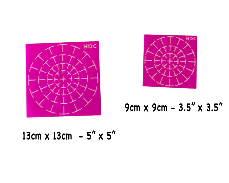 May include: Two pink plastic stencils with a circular pattern of white lines. The larger stencil is 5 inches by 5 inches and the smaller stencil is 3.5 inches by 3.5 inches.
