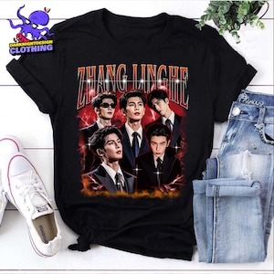 May include: A white ceramic mug with a black handle and the text "But First, Coffee" in a black, bold font. The mug is on a white surface. The mug is approximately 4 inches tall.