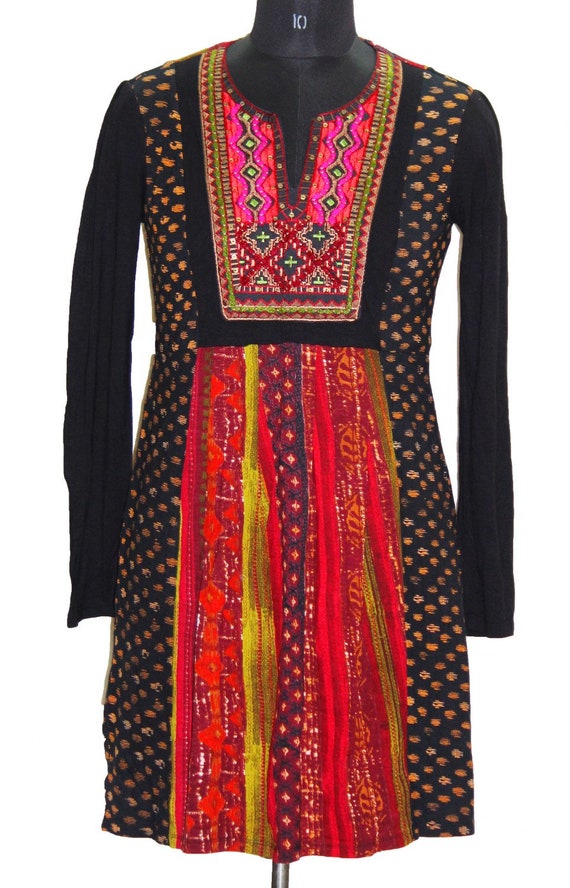 Lehereya kurta hand painted to form the lehereya pattern; adorned with intricate ari and sequin hand work.
