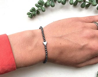 Dainty Hematite Bracelet: Heart Charm, Grounding Crystal